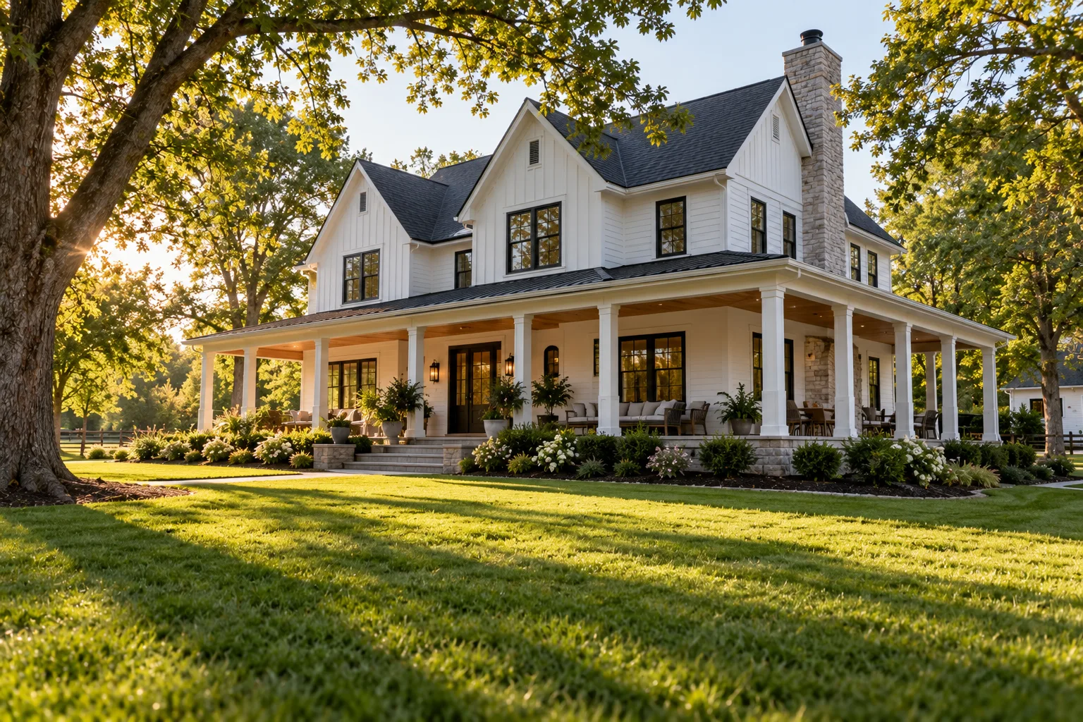 White farmhouse with a wraparound porch